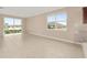 Sunlit living area with tile floors and sliding glass doors leading to the outdoors at 7337 Sw 89Th Ter, Ocala, FL 34481