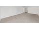 Bedroom featuring neutral carpet and white walls at 7624 Sw 60Th St, Ocala, FL 34474