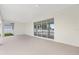 Extended patio area with sliding glass doors, perfect for seamless indoor-outdoor living at 7624 Sw 60Th St, Ocala, FL 34474