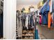 Walk in closet with organized shelving and racks for clothes, shoes, and accessories at 8053 Sw 62Nd Ave, Ocala, FL 34476