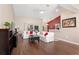 Spacious living room featuring hardwood floors and sliding glass doors leading to outdoor at 8053 Sw 62Nd Ave, Ocala, FL 34476
