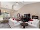 Inviting living room featuring vaulted ceilings, modern furnishings, and an open floor plan at 8053 Sw 62Nd Ave, Ocala, FL 34476