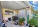 Backyard featuring an air conditioner, some plants, and a partial fence at 9661 Sw 95Th Ct # B, Ocala, FL 34481