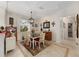 Charming dining room with a stylish chandelier and bright natural light at 9663 Sw 92Nd Place Rd, Ocala, FL 34481