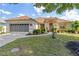 Charming single-story home with a well-manicured lawn and inviting curb appeal at 9663 Sw 92Nd Place Rd, Ocala, FL 34481