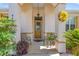 Cozy front porch with seating and decorative accents at 9663 Sw 92Nd Place Rd, Ocala, FL 34481