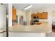 Well-maintained kitchen featuring wood cabinets, stainless steel appliances, and ample counter space at 9663 Sw 92Nd Place Rd, Ocala, FL 34481