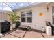 Exterior patio with seating and grill at 9663 Sw 92Nd Place Rd, Ocala, FL 34481