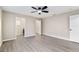 Large bedroom with ceiling fan, open closet, and neutral paint at 9729 Sw 97Th St, Ocala, FL 34481