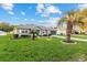 Charming single-story home with well-maintained landscaping and a lush green lawn at 9729 Sw 97Th St, Ocala, FL 34481