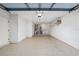 Spacious two car garage with epoxy floors, and plenty of room for storage at 9729 Sw 97Th St, Ocala, FL 34481