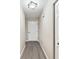Bright hallway featuring clean lines, fresh paint, and modern lighting at 9729 Sw 97Th St, Ocala, FL 34481