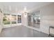 Screened lanai leading indoors to a bright kitchen with bar seating at 9729 Sw 97Th St, Ocala, FL 34481