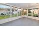 Relaxing lanai with large screened windows for a clear view of the back yard at 9729 Sw 97Th St, Ocala, FL 34481