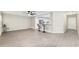 Open-concept living room blending seamlessly with the kitchen, perfect for entertaining at 9729 Sw 97Th St, Ocala, FL 34481