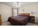 Cozy bedroom featuring a ceiling fan and neutral walls at 11140 Sw 53Rd Cir, Ocala, FL 34476