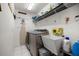 Functional laundry room with new washer and dryer and utility sink at 11140 Sw 53Rd Cir, Ocala, FL 34476