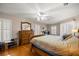 Main bedroom showcasing hardwood floors, natural light, and ample closet space at 11140 Sw 53Rd Cir, Ocala, FL 34476