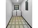 Bright laundry room with a washer and dryer; a window provides natural light and ventilation at 11230 Se 47Th Ave, Belleview, FL 34420