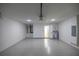 Large, clean garage with painted floor at 13314 Se 41St Ct, Belleview, FL 34420