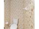 Bathroom with floral wallpaper featuring toilet and vanity at 1404 Se 40Th Ct, Ocala, FL 34471