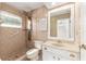Bathroom with updated shower and vanity and neutral color scheme at 1404 Se 40Th Ct, Ocala, FL 34471