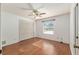 Bedroom with hardwood floors, closet and window at 1404 Se 40Th Ct, Ocala, FL 34471