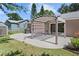 Well-maintained backyard featuring a covered pergola, perfect for outdoor living and entertaining at 15917 Hidden Lake Cir, Clermont, FL 34711