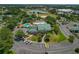 Aerial view of the community center, pool, and parking lot offering a glimpse of community amenities at 17233 Se 115Th Terrace Rd, Summerfield, FL 34491