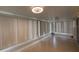 Airy sunroom with tile flooring and many windows, offering ample natural light at 17522 Se 96Th Ct, Summerfield, FL 34491