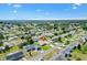 Spacious residential area displaying neat lawns and mature trees on a sunny day at 17576 Se 96Th Ct, Summerfield, FL 34491
