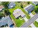 Roof of lovely home featuring meticulously maintained landscaping and hardscape features at 17576 Se 96Th Ct, Summerfield, FL 34491
