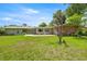 Well-maintained backyard with a patio, perfect for outdoor relaxation and entertaining at 1852 Ne 39Th Ct, Ocala, FL 34470