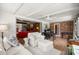 Cozy living room featuring brick accents and neutral decor at 1852 Ne 39Th Ct, Ocala, FL 34470