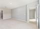 Carpeted bedroom with large closet and neutral colors at 1875 Nw 44 Court Rd, Ocala, FL 34482