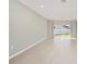 Living room with wood flooring, lots of natural light and neutral paint at 1875 Nw 44 Court Rd, Ocala, FL 34482