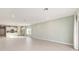 Open concept living room with natural lighting and a view of the kitchen at 1875 Nw 44 Court Rd, Ocala, FL 34482