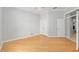 Spacious bedroom features light hardwood flooring and ample closet space at 2010 Se 25Th St, Ocala, FL 34471