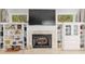 Elegant fireplace with built-in bookshelves, drawers, and mantel at 2010 Se 25Th St, Ocala, FL 34471