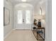 Bright entryway with tiled floors leading to a formal living area at 2010 Se 25Th St, Ocala, FL 34471