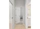 Hallway leading to bathroom with tile flooring at 2010 Se 25Th St, Ocala, FL 34471