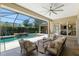 Screened lanai featuring outdoor lounge area and view of beautiful backyard pool at 2010 Se 25Th St, Ocala, FL 34471