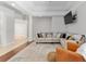 Comfortable living room with a sectional sofa, designer rug, and seamless access to other areas of the home at 2010 Se 25Th St, Ocala, FL 34471