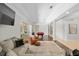 Bright and open living area, featuring modern decor, wood floors and ample natural light at 2010 Se 25Th St, Ocala, FL 34471