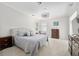 Serene main bedroom featuring soft colors, large windows, and comfortable furnishings at 2010 Se 25Th St, Ocala, FL 34471