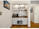 Wet bar area with sink, storage, and countertop space, perfect for entertaining at 20861 Sw 81St Loop, Dunnellon, FL 34431