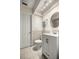 Well-lit bathroom featuring a vanity with modern fixtures and tile flooring, and a toilet at 20861 Sw 81St Loop, Dunnellon, FL 34431