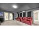 Home theater features comfortable seating, large screen, projector, and soundproofing at 20861 Sw 81St Loop, Dunnellon, FL 34431