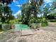 Tranquil waterfront access with clear blue water and stairs leading to a refreshing swimming or launching area at 20861 Sw 81St Loop, Dunnellon, FL 34431