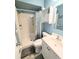 Compact bathroom featuring a shower, toilet, and vanity with storage at 21298 Sw Peach Blossom St, Dunnellon, FL 34431